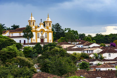 Cityscape of tiradentes with church, hill and houses