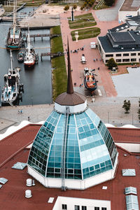 High angle view of boats moored at harbor