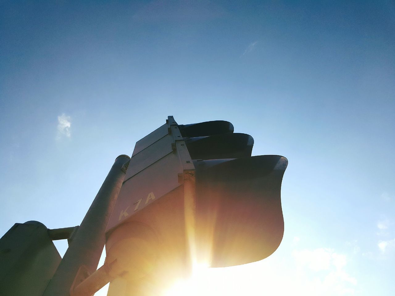 sun, low angle view, sunbeam, sunlight, blue, sky, lens flare, sunset, bright, sunny, outdoors, nature, no people, day, back lit, tranquility, cloud, beauty in nature, cloud - sky, glowing, scenics, tranquil scene