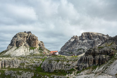 Panoramic view of rock formations against sky