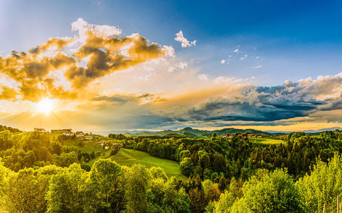 Scenic view of landscape against sky during sunset