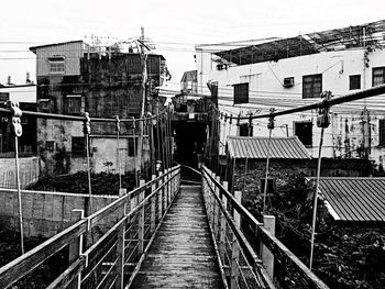 Alley amidst buildings in city