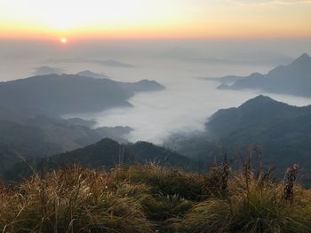 Scenic view of mountains against sky during sunset