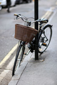 Close-up of bicycle on street