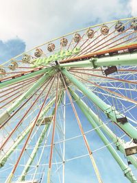Low angle view of ferris wheel against sky