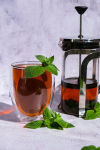 Tea with mint. transparent cup of herbal tea with fresh mint. healthy melissa tea natural organic 