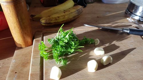 High angle view of chopped cutting board on table