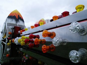 Multi colored lanterns hanging in row