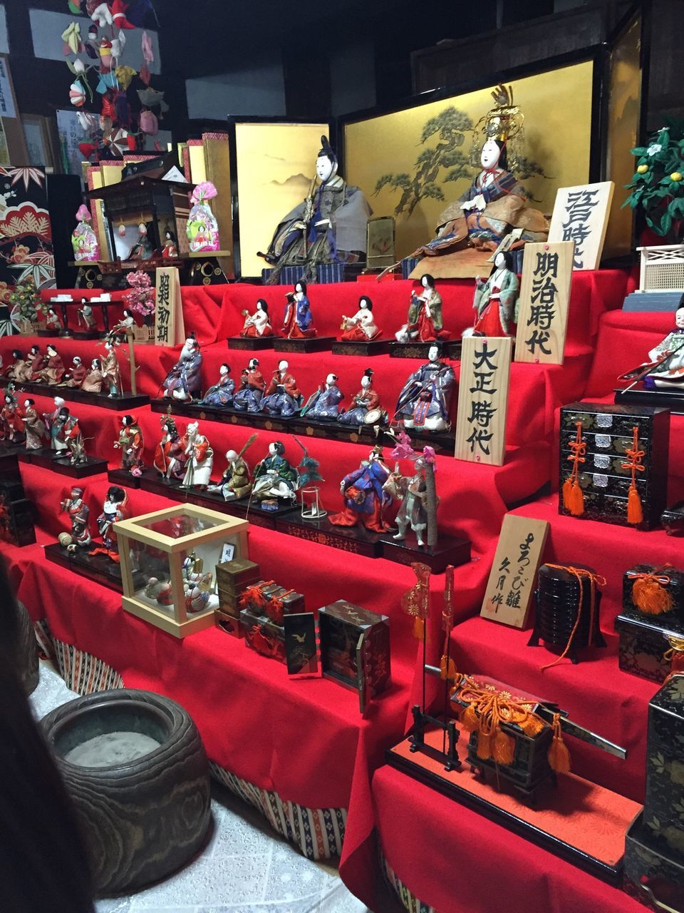 indoors, red, large group of objects, abundance, chair, arrangement, retail, in a row, variation, choice, hanging, table, order, for sale, still life, no people, shelf, market, restaurant, absence