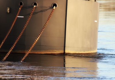 Close-up of rope tief to a boat