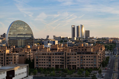 Buildings in city against sky