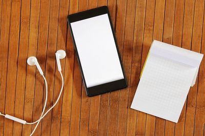 High angle view of mobile phone on table