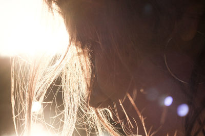 Close-up of woman at night