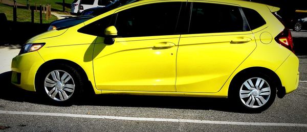 Yellow car on street