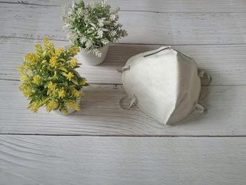 High angle view of white rose on table