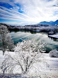 Scenic view of frozen lake against sky