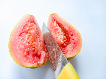 Close-up of fruits against white background