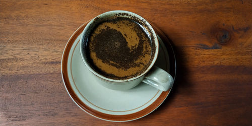 High angle view of coffee on table
