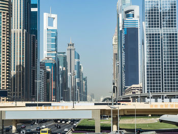 Modern buildings in city against sky