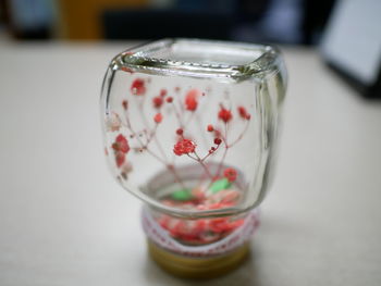 Close-up of jar on table