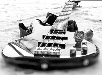 Close-up of guitar on table