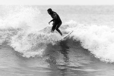 Man surfing in sea
