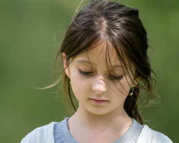 Close-up of girl standing outdoors