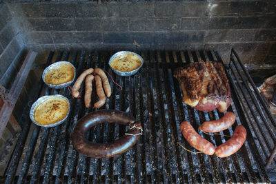 High angle view of food on barbecue grill