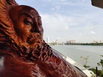 Close-up of statue against sky