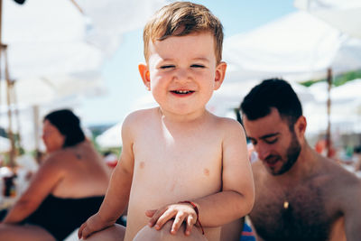 High angle view of shirtless boy