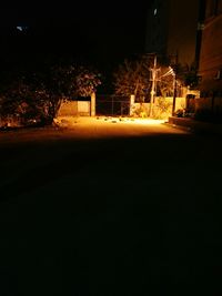 Illuminated street lights at night