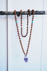 Low angle view of love hanging on wall