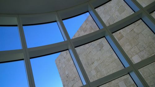 Low angle view of building against blue sky