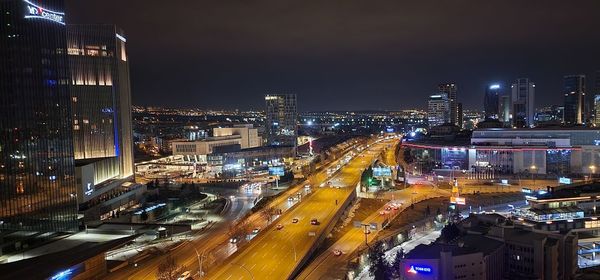 High angle view of illuminated city at night