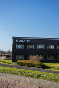 View of building against clear blue sky