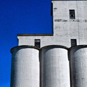 Low angle view of building against blue sky