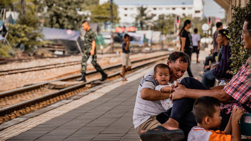 People on railroad platform