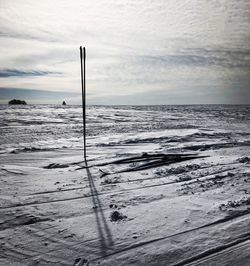 Scenic view of sea against sky during winter