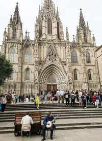 Group of people in front of building