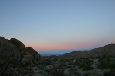 Scenic view of mountains at sunset