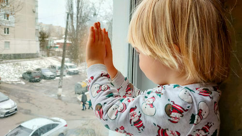 Rear view of woman looking away