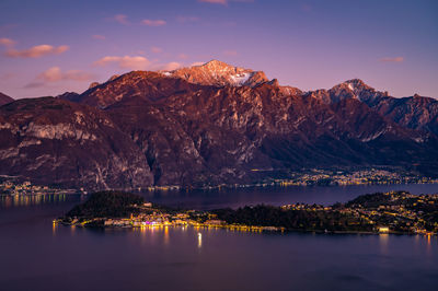 Lake como, bellagio, tremezzo and the mountains above, from tremezzo, at sunset.