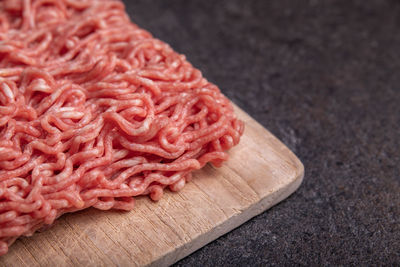 Close-up of chopped bread on cutting board