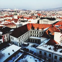 High angle view of houses in city during winter