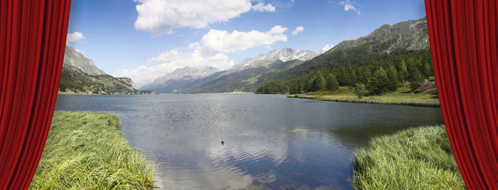 Panoramic view of lake and mountains against sky