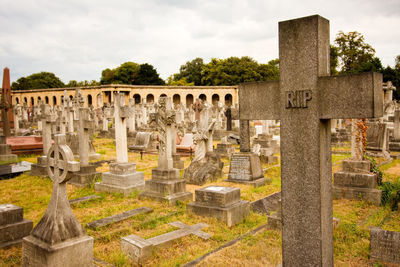 London cemetery. closeup of an rip cross.