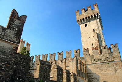 Low angle view of historic building against sky