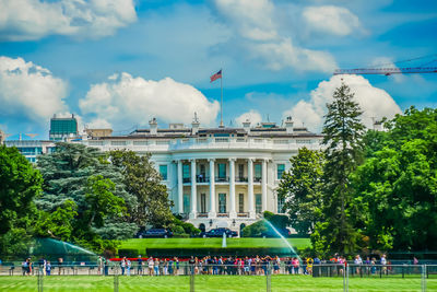 Group of people in front of building