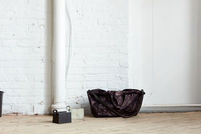 Fashion bag in rustic industrial space