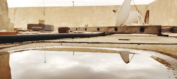 Close-up of machinery on table by factory